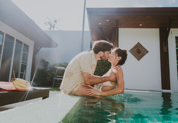 Happy couple spending time in a beautiful vacation house