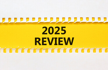 Planning 2025 review new year symbol. Concept words 2025 Review on beautiful yellow paper. Beautiful white background. Business 2025 review new year concept. Copy space.