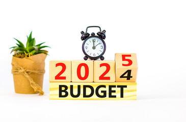 Planning 2025 budget new year symbol. Concept words 2024 Budget to 2025 Budget on beautiful wooden...