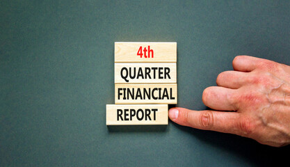 4th quarter financial report symbol. Concept words 4th quarter financial report on beautiful wooden blocks. Beautiful grey background. Business 4th quarter financial report concept. Copy space.