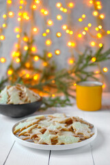 Homemade cookies and a cup of cocoa. The atmosphere of Christmas and comfort.