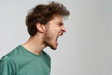 Fototapeta premium Attractive guy with neat hair yelling at girlfriend in fight.