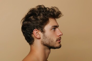 Fototapeta premium Serious young man profile photo with empty space background