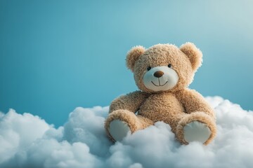 Obraz premium A plush bear sits contently on a fluffy cloud against a bright blue sky in daylight
