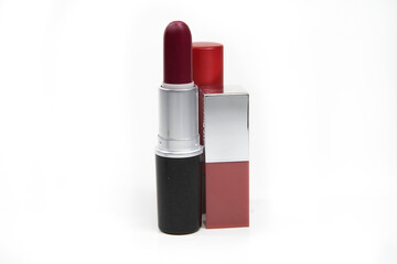 Isolated red lipsticks over white background