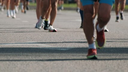 Marathon runners competing in race on asphalt. Concept of sport, healthy lifestyle, active life