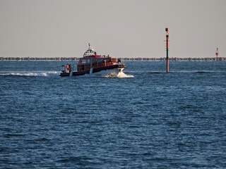 little fire fighter boat in the gulf of la spezia