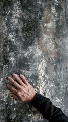 Hand touching a textured, weathered wall, evoking a sense of history and decay, AI