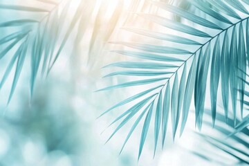 Close up of vibrant green palm leaves against a softly blurred background in a tropical setting