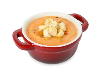 Delicious sweet potato soup with croutons isolated on white