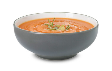 Delicious sweet potato soup with pumpkin seeds in bowl isolated on white