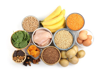 Different products rich in iron on white background, top view. Anemia diet plan