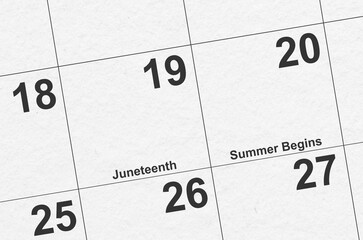 Calendar close up of Juneteenth and First Day of Summer