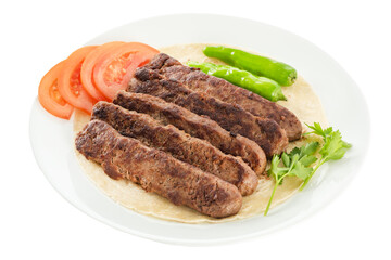 Turkish style meatballs on lavash, served with tomatoes and fresh peppers.