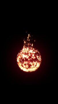 Fire ball or fire sphere. Fireball burning real flames. Close up fireball or fire comes isolated on black background. Fire visual effect. Animation of the flame. Vertical video for social networks.
