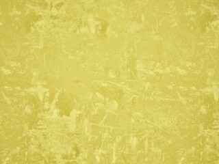 Abstract yellow textured background with distressed and mottled effect.