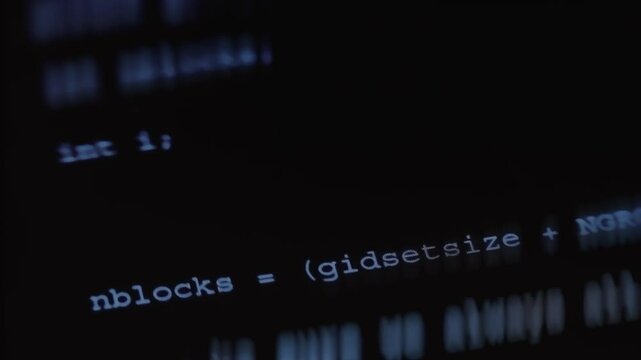Blue hacker text code appearing on screen, macro view
