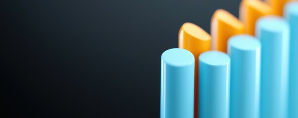 Obraz premium Close-up of colorful bar chart in blue and orange on dark background. Business data and statistics concept.