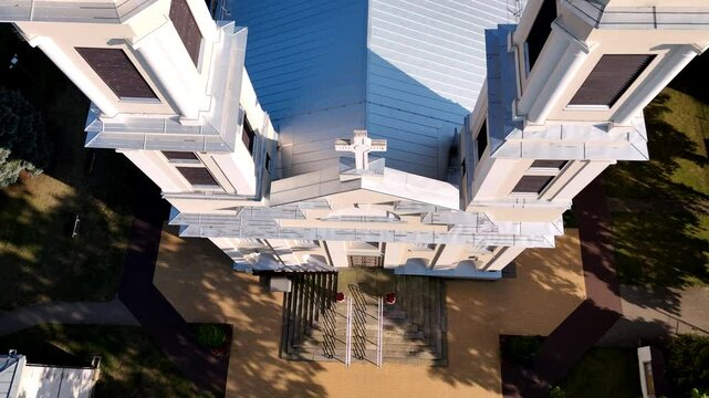 Overhead Drone View of a Church Roof with Towers and Crosses in Jonava, Lithuania