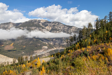 Fototapeta premium Highway in a valley in the Canadian Rocky Mountains