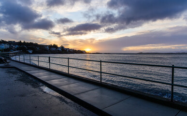 Fototapeta premium Serene Sunrise Over Ocean in Victoria, Vancouver Island