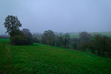 Fog outside the city on a cloudy autumn day in Bavaria.