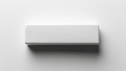 a white rectangular object on a white surface
