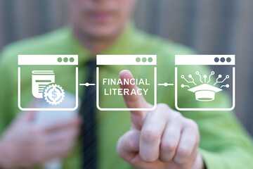 Business person using virtual touch screen presses text: FINANCIAL LITERACY. Financial literacy and...
