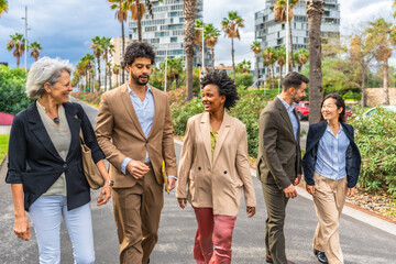 Business people walking along the city after work