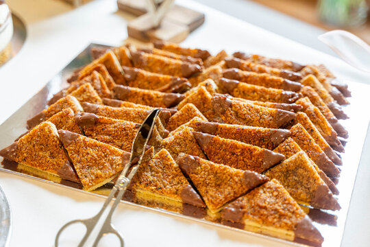 Plate of German nut corner (Nussecke) on a wedding party