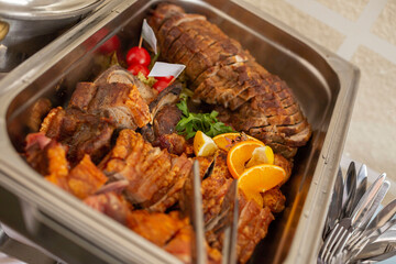 Crispy roast and roast pork at a bavarian wedding buffet