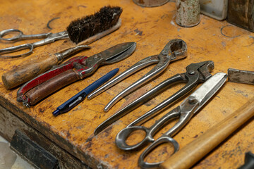 Tools for shoemaking on a table