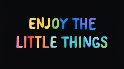 Obraz premium Positive motivational phrase “Enjoy the little things” on a black background written in cheerful colorful letters 