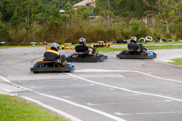 drivers on a go-kart track in Rio de Janeiro.
