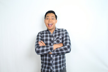 Fototapeta premium attractive asian man shocked and surprised isolated on white with crossed hand wearing casual shirt