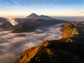 Aerial view Mountains at Bromo volcano during sunrise sky,Beautiful Mountains Penanjakan in Bromo Tengger Semeru National Park,East Java,Indonesia.Nature landscape background
