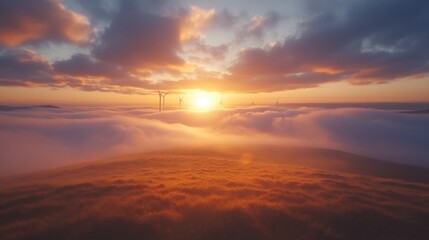 Fototapeta premium Misty wind farm at sunrise.