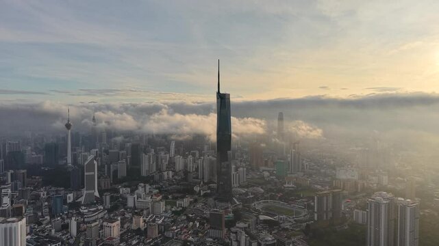 aerial Kuala Lumpur clear sunrise with lowcloud downtown area