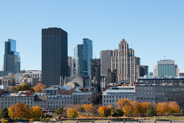 A view of buildings, part of the city skyline of downtown Montreal, Quebec, Canada as seen from King Edward Quay on the St. Lawrence river.