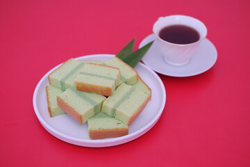 pandan cake on white plate. Selective focus.