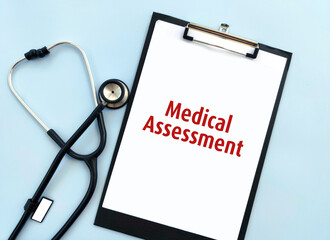 clipboard and stethoscope on blue background with medical assessment text. medical evaluation...
