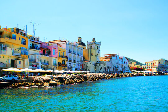 ISCHIA, ITALY - CIRCA JULY 2016: Colored buildings in Ischia. Ischia is the largest of the Phlegrean Islands, it is roughly trapezoidal in shape, and it has about 34 km (21 miles) of coastline