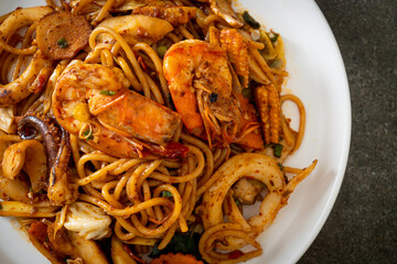 stir fried Tom Yum seafood dried spaghetti