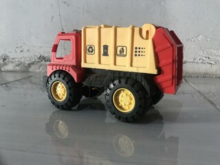 Toy Garbage Truck Isolated on White with reflek photo