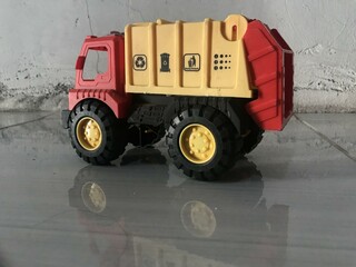 Toy Garbage Truck Isolated on White with reflek photo