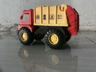 Toy Garbage Truck Isolated on White with reflek photo