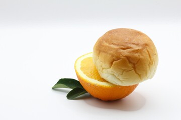 orange slices and bread on isolated background