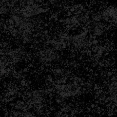 Abstract black background coated with black particles.
