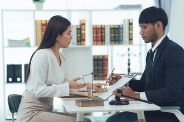 Legal Consultation: Client and Lawyer Discussing Case Details