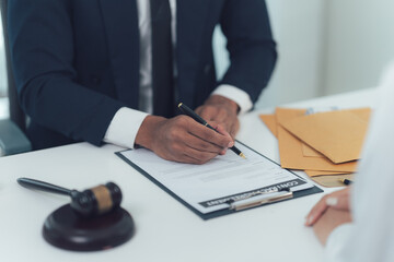 Lawyer Signing Legal Document 